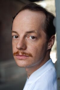 Póster de Merlin Sandmeyer
